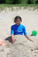 Ali buried in sand