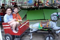 Jordan and Jessie on ride at Deer Forest